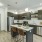 Kitchen with island and brown cabinetry