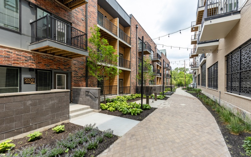 Exterior of apartments with string lights