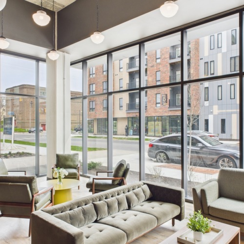Lounge in style at The Grounds Apartments Lounge with seating and large windows
