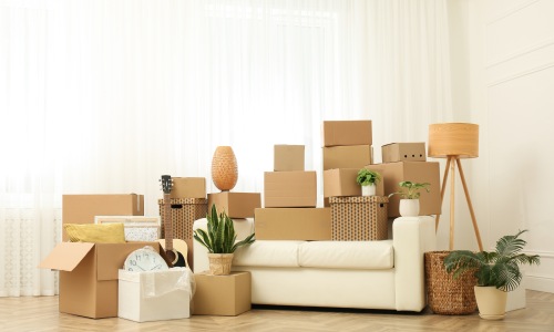 Luxury apartments in Herron Morton A bunch of moving boxes around sofa