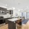 Styled apartment kitchen with brown cabinets