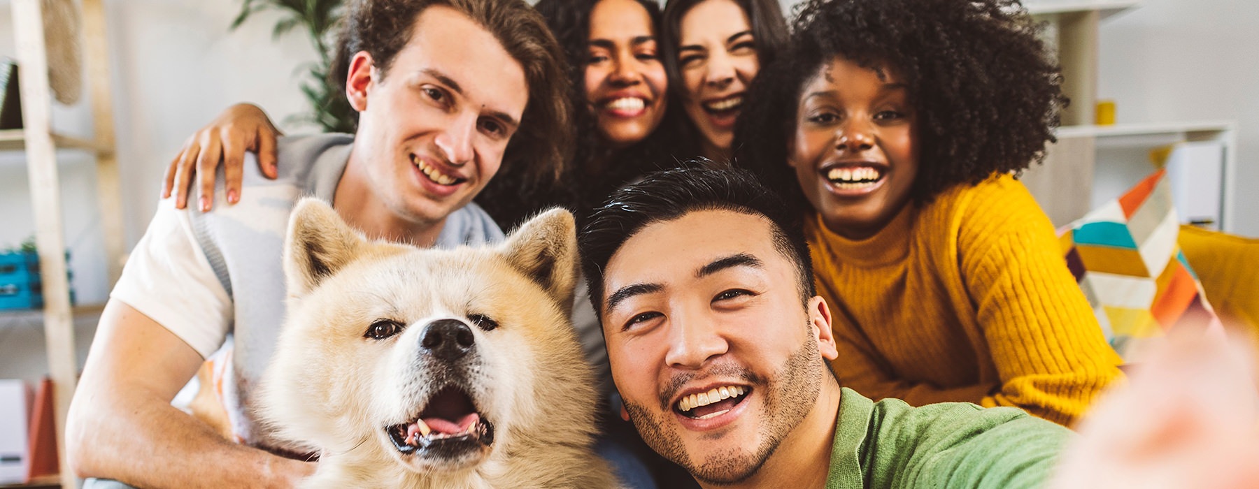 Group of friends hanging out laughing 