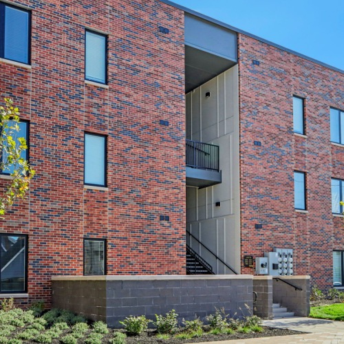 Luxury living in Herron-Morton Place Brick apartment building exterior